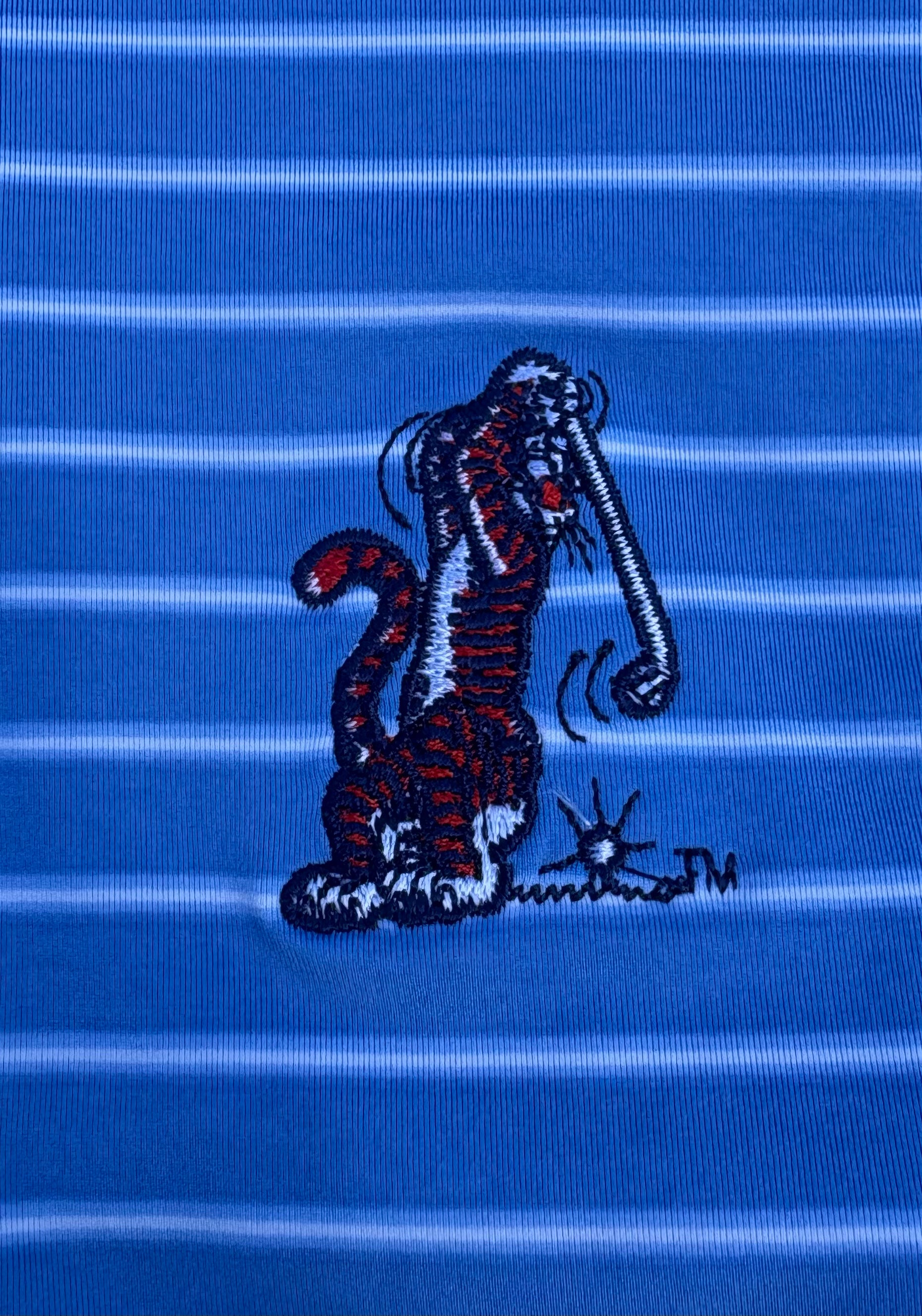 B. Draddy Sport Striped Polo
